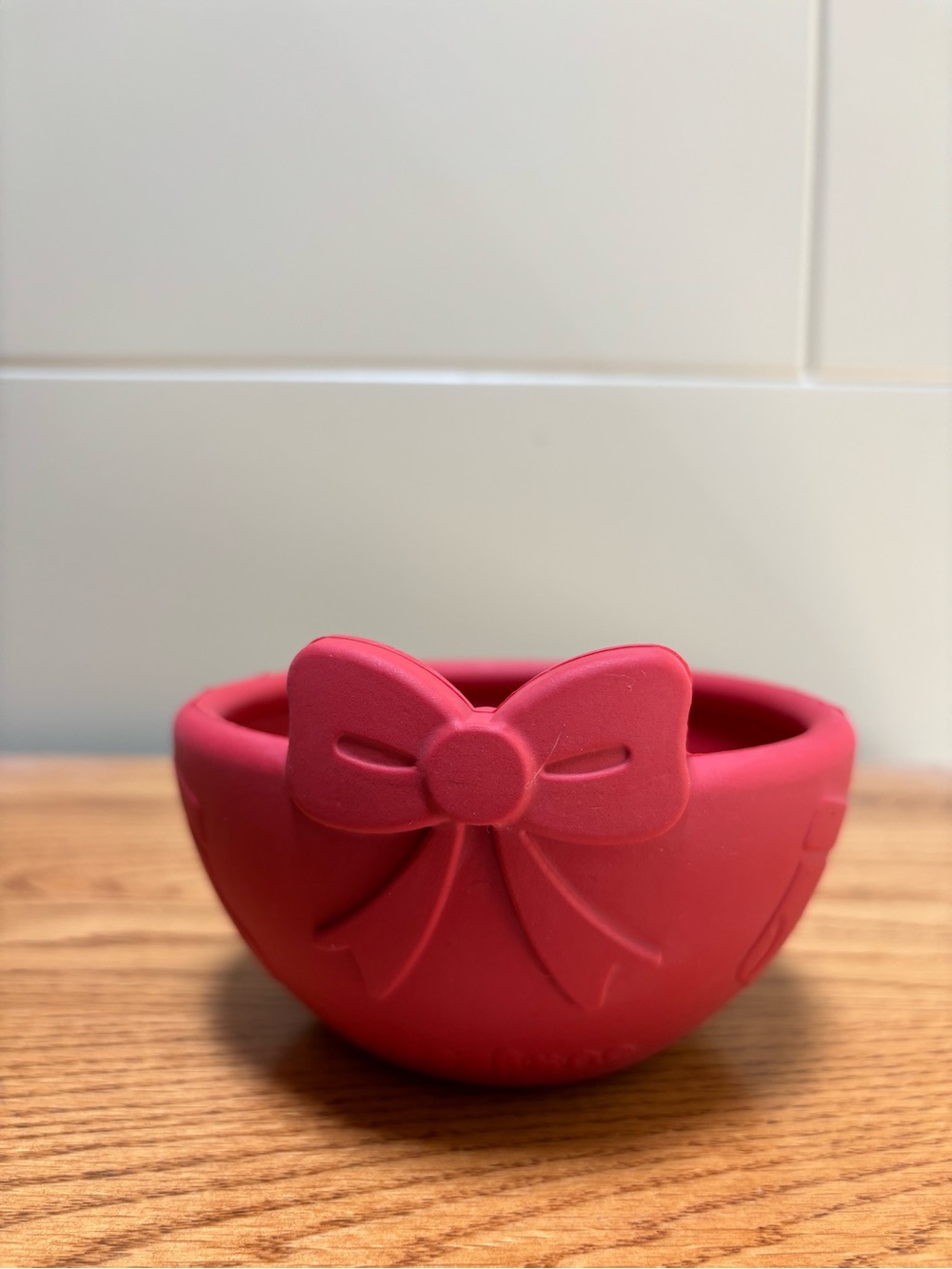 FreezBone dog enrichment toy red bow holiday limited edition